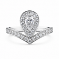 Pear Cut Main Stone Halo with Curved V-Shape Half Pave Band